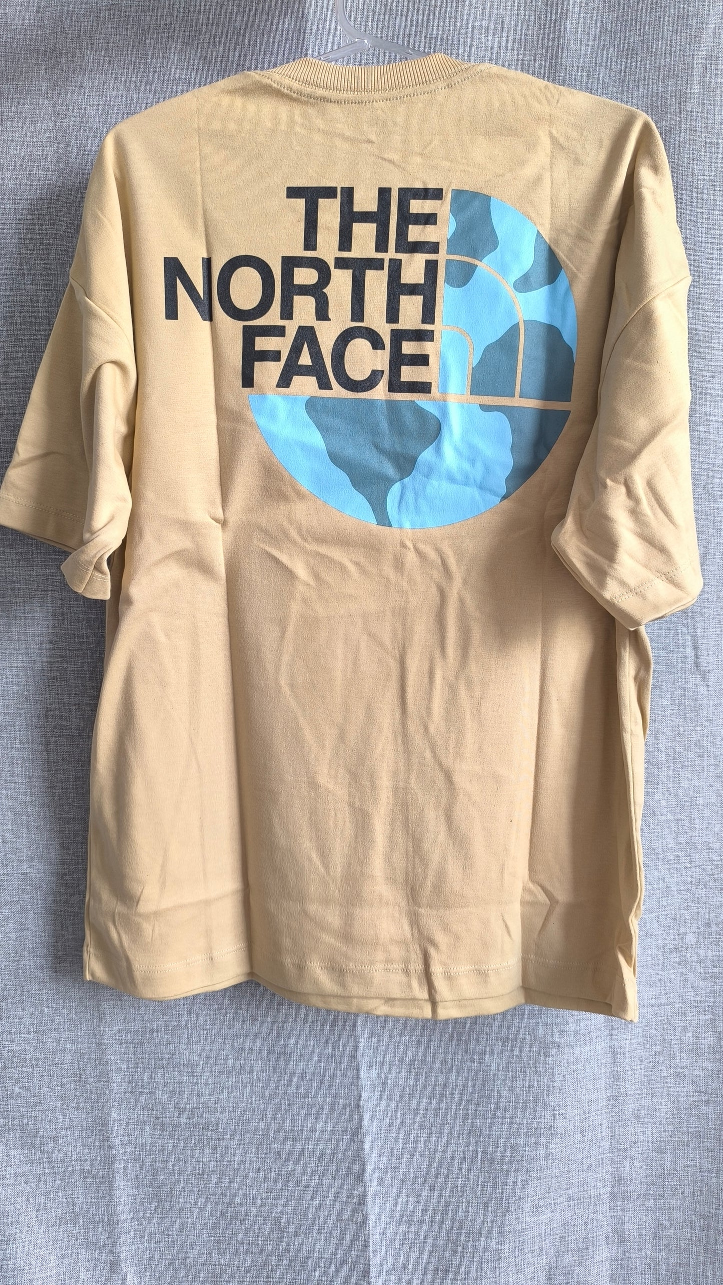 Remera Oversized TNF World