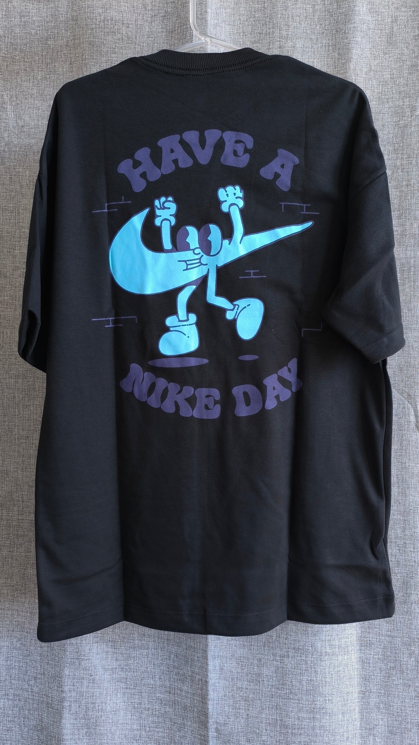 Remera Oversized Have a NK Day