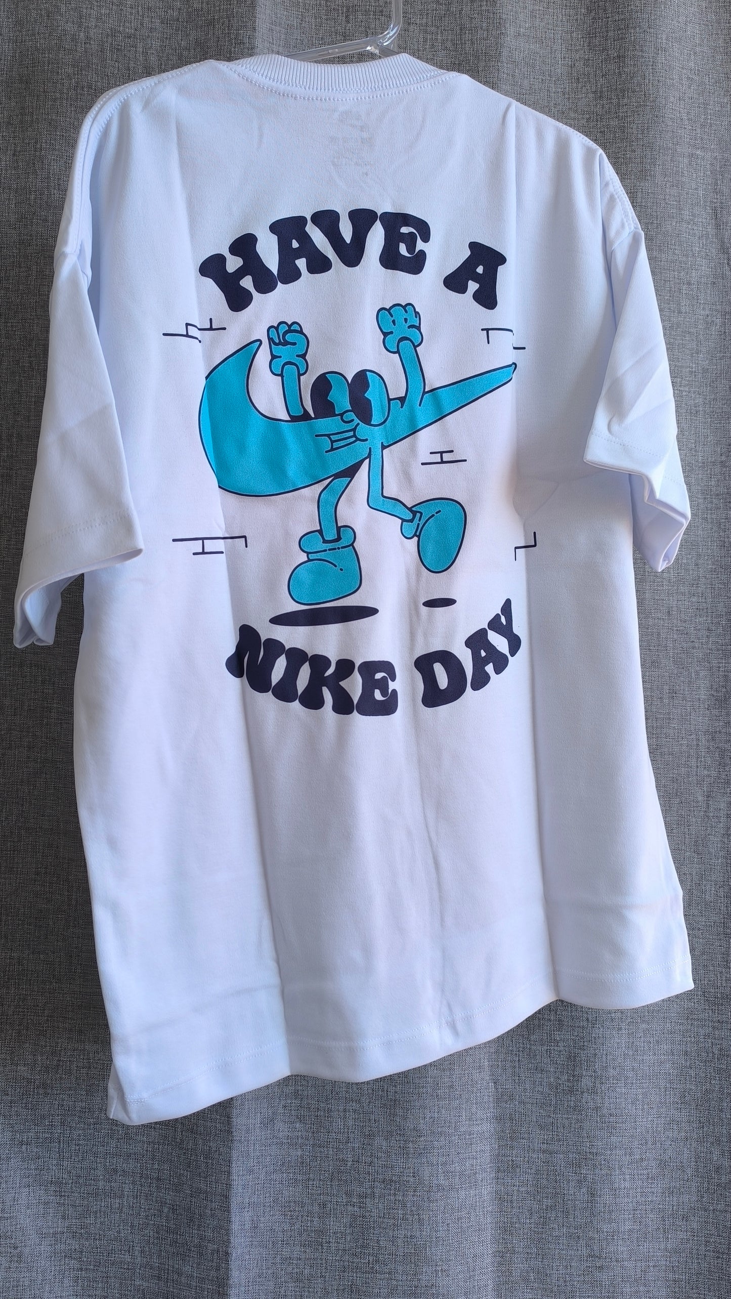 Remera Oversized Have a NK Day