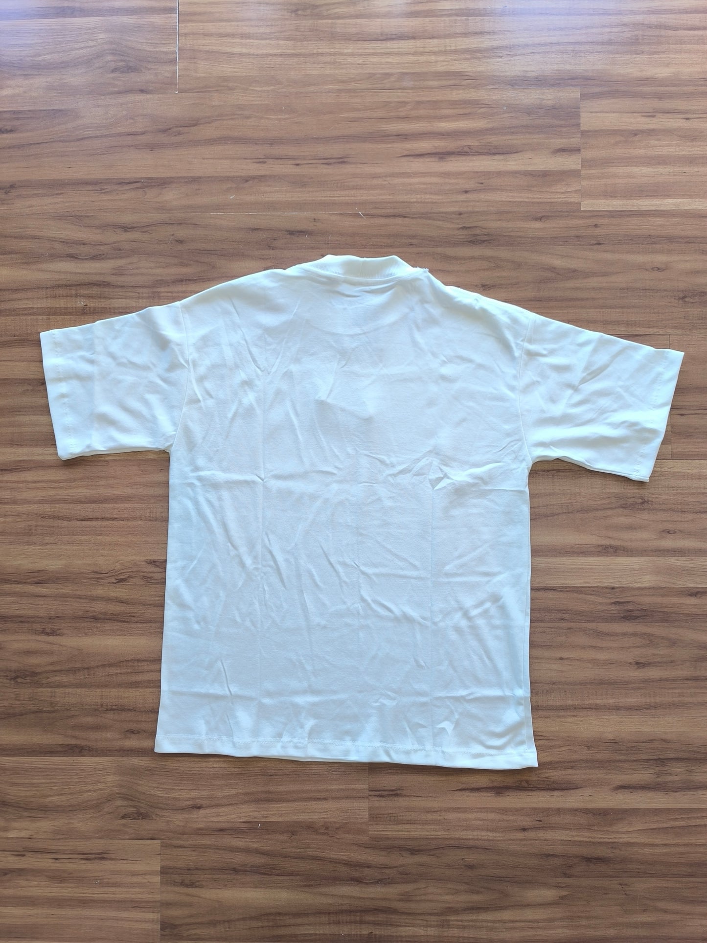 Remera Oversized Bordada NK District