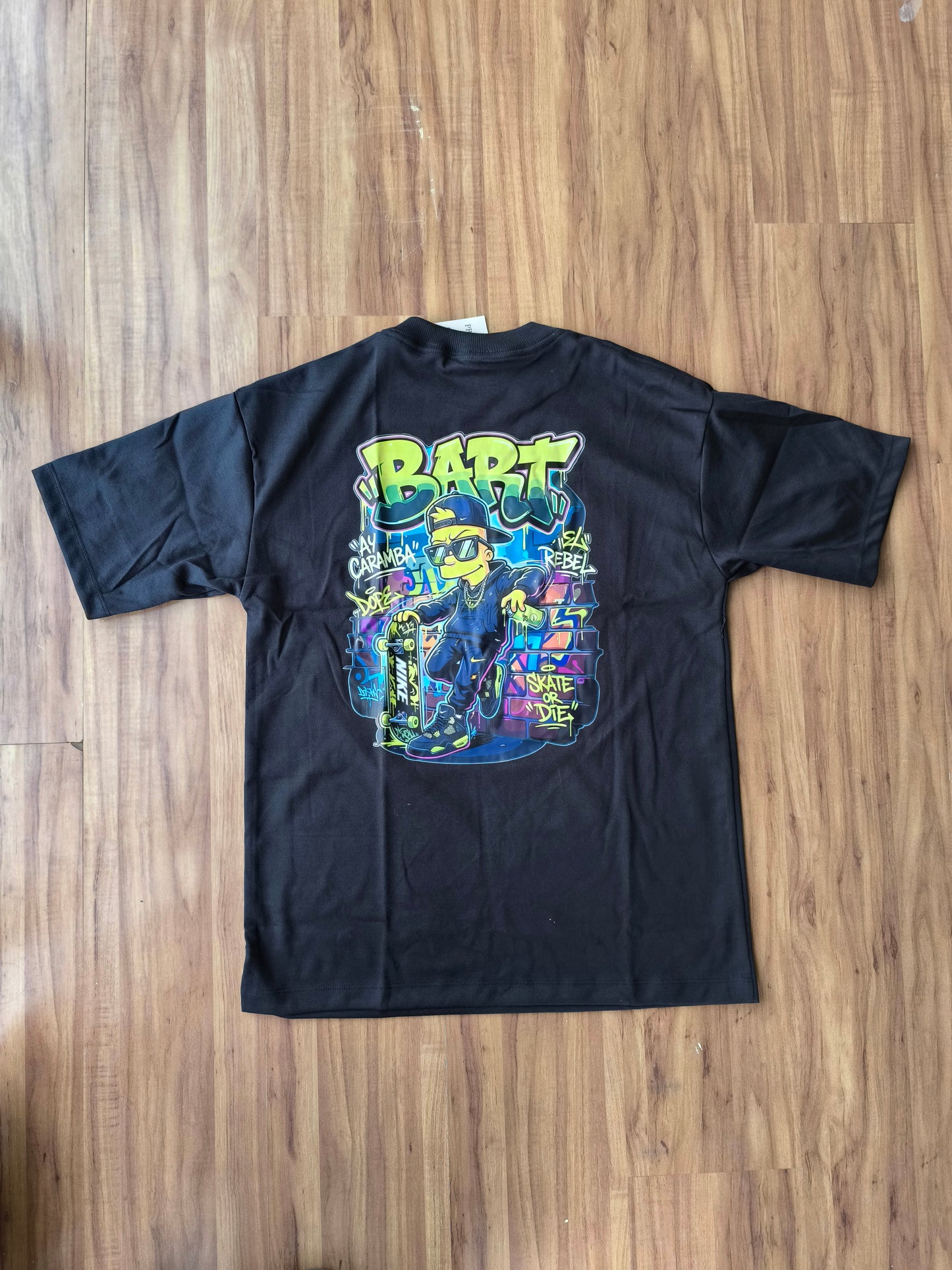 Remera Oversized NK Bart Rebel