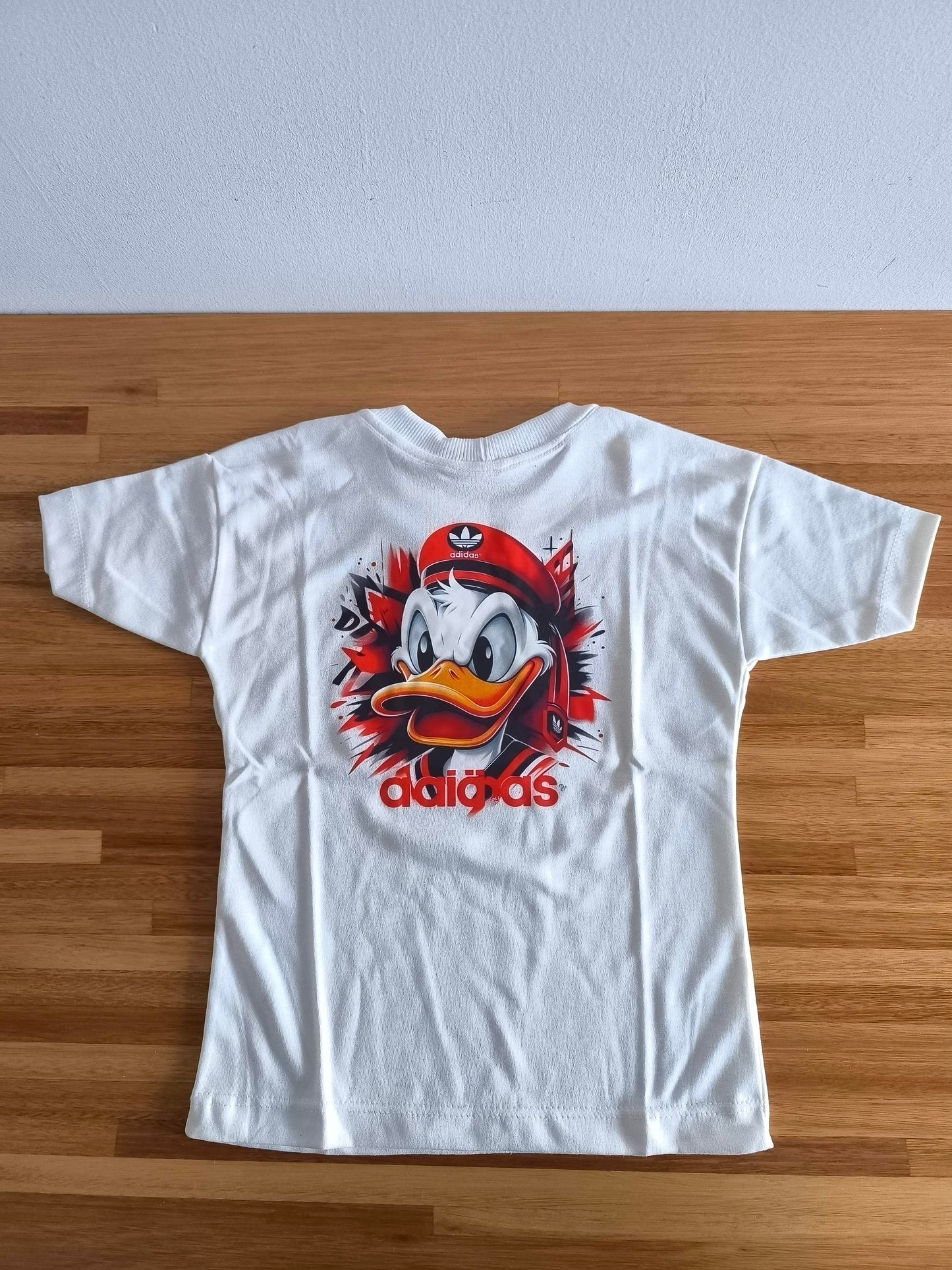 Remera Oversized ADI Capitan Donald