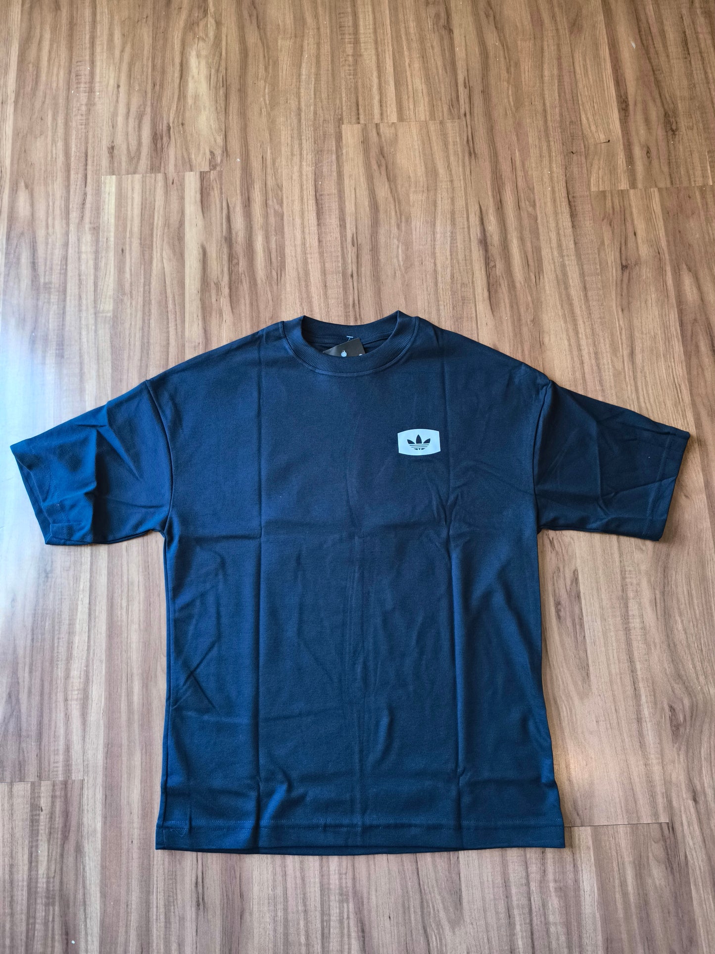 Remera Oversized ADI Property