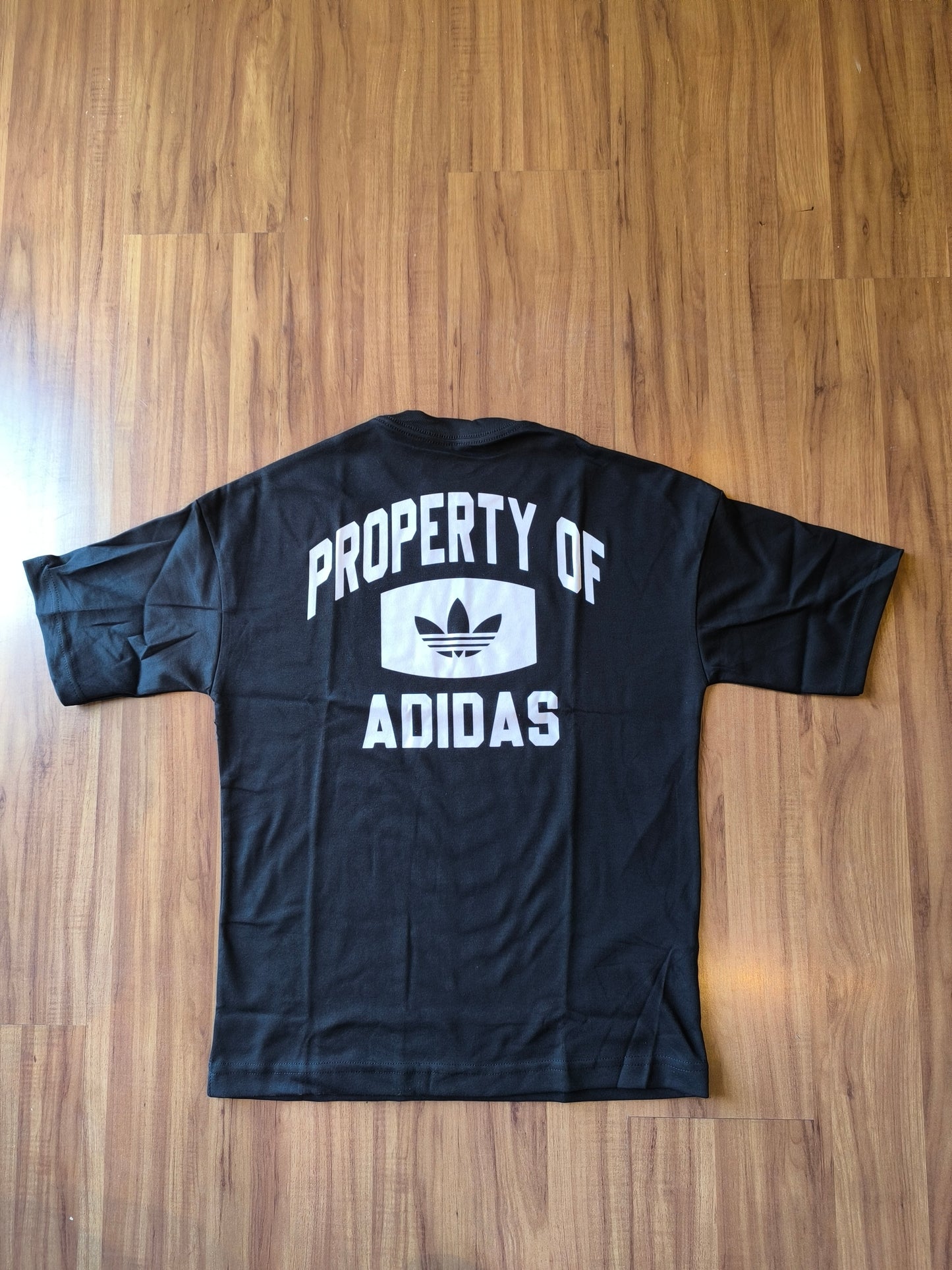 Remera Oversized ADI Property