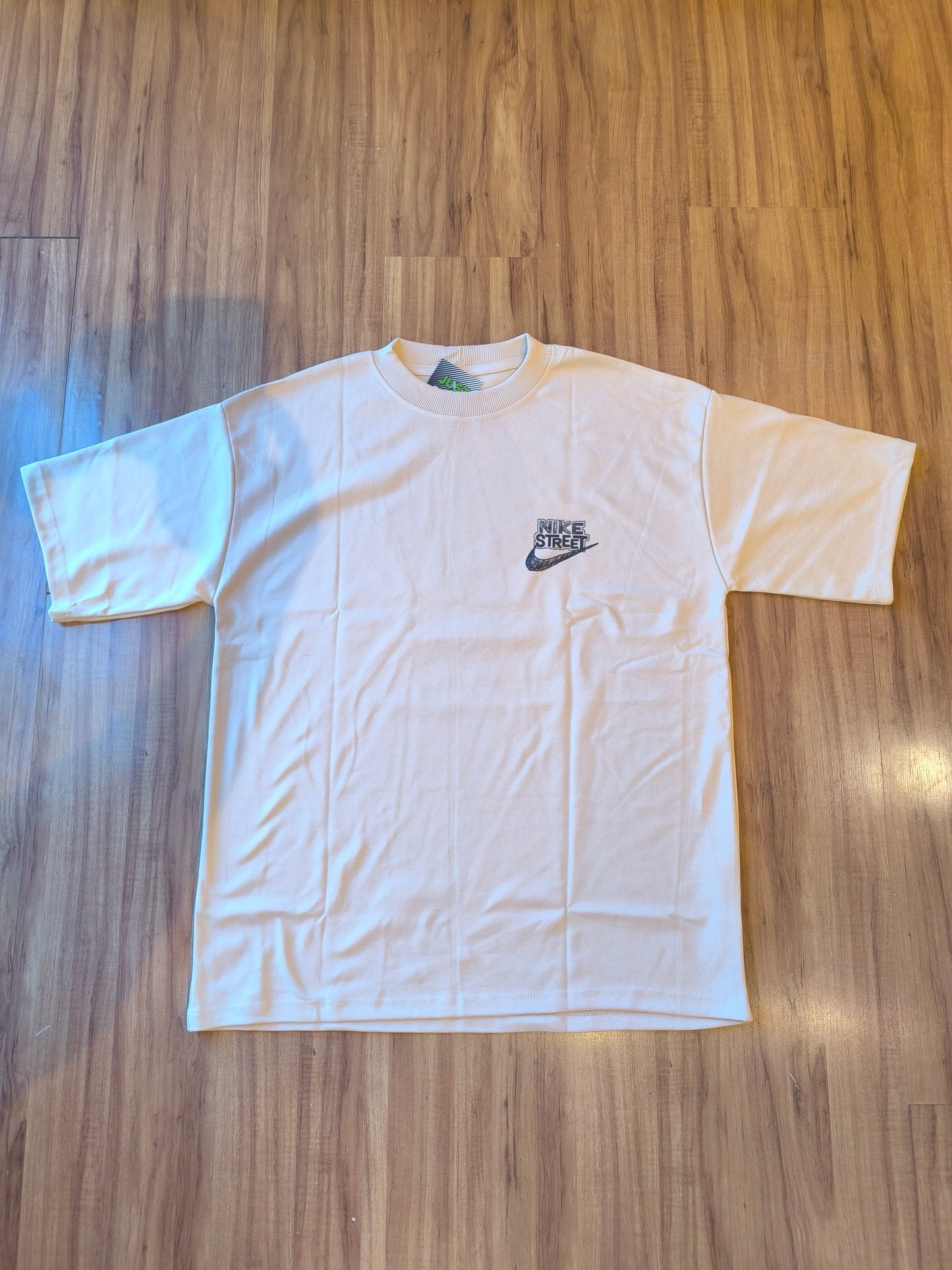 Remera Oversized NK Back Street