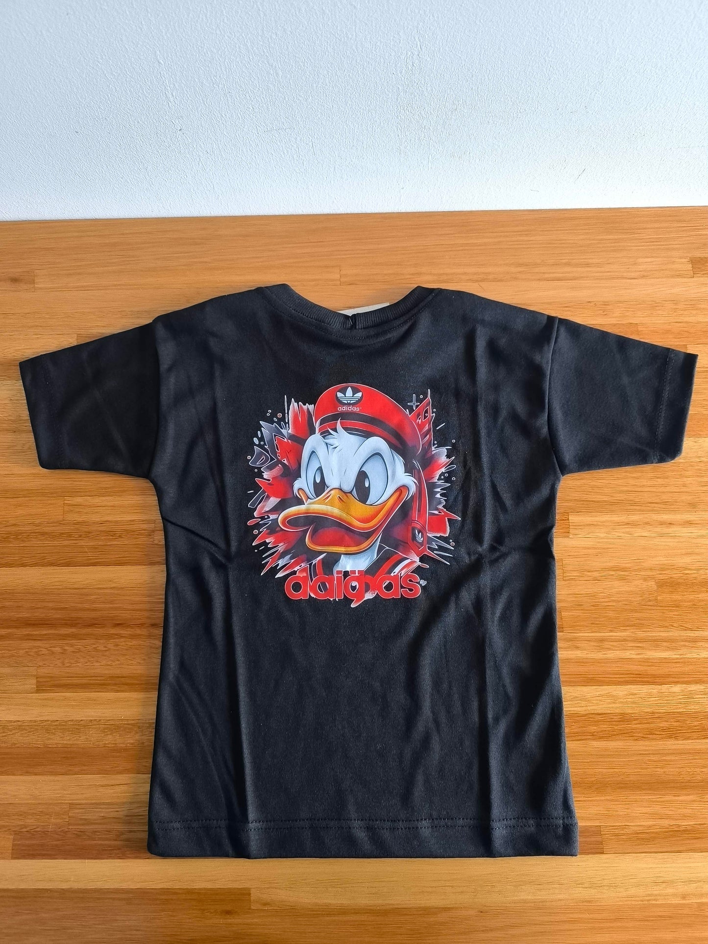 Remera Oversized ADI Capitan Donald